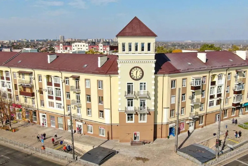 House with a clock before the war